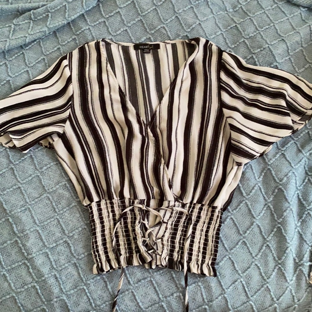 Cute striped blouse with a corset style waist!